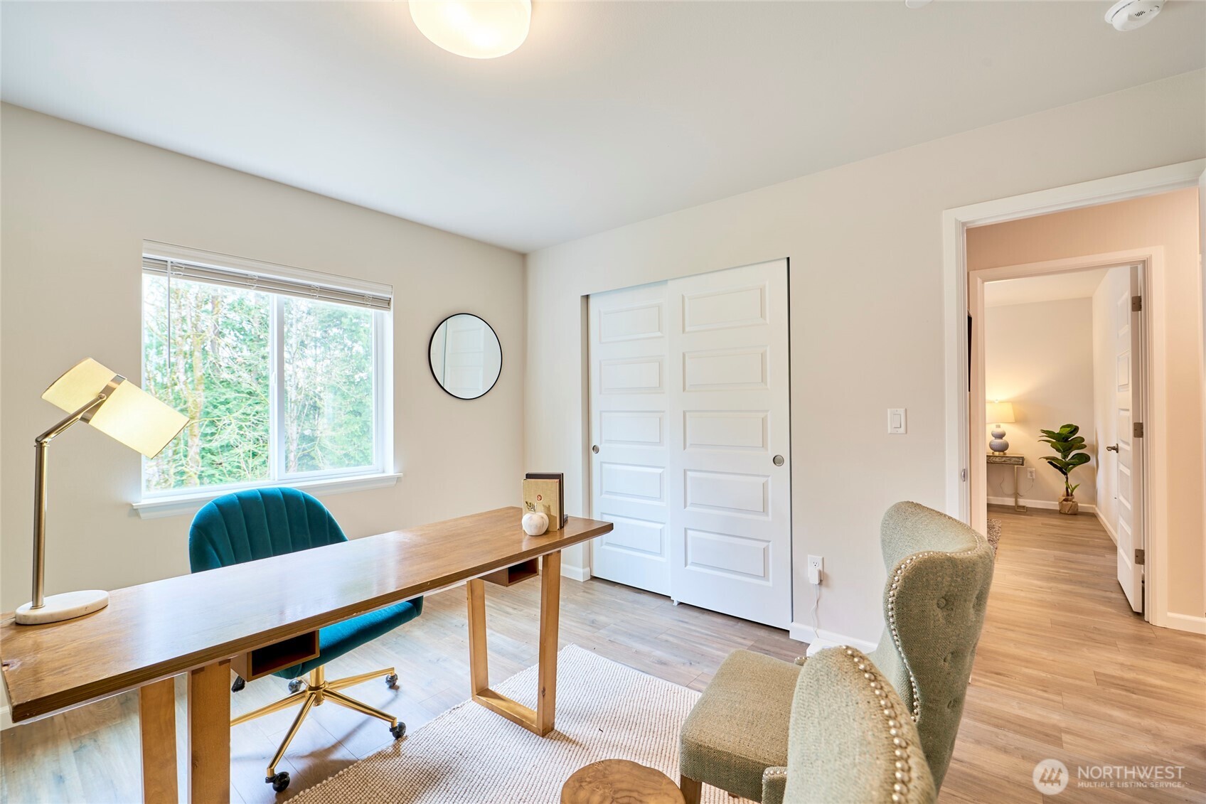 4022 233rd Street Southeast Bothell, WA 98021 - Photo 28 of 40 a workspace with furniture and a window