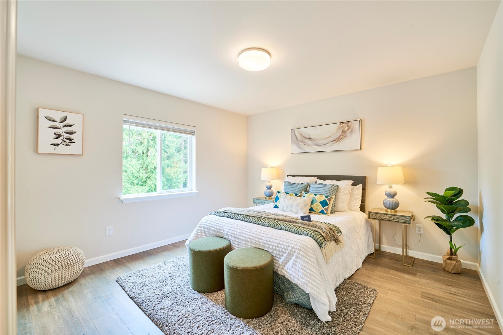 4022 233rd Street Southeast Bothell, WA 98021 - Photo 29 of 40 a bedroom with a bed and a window
