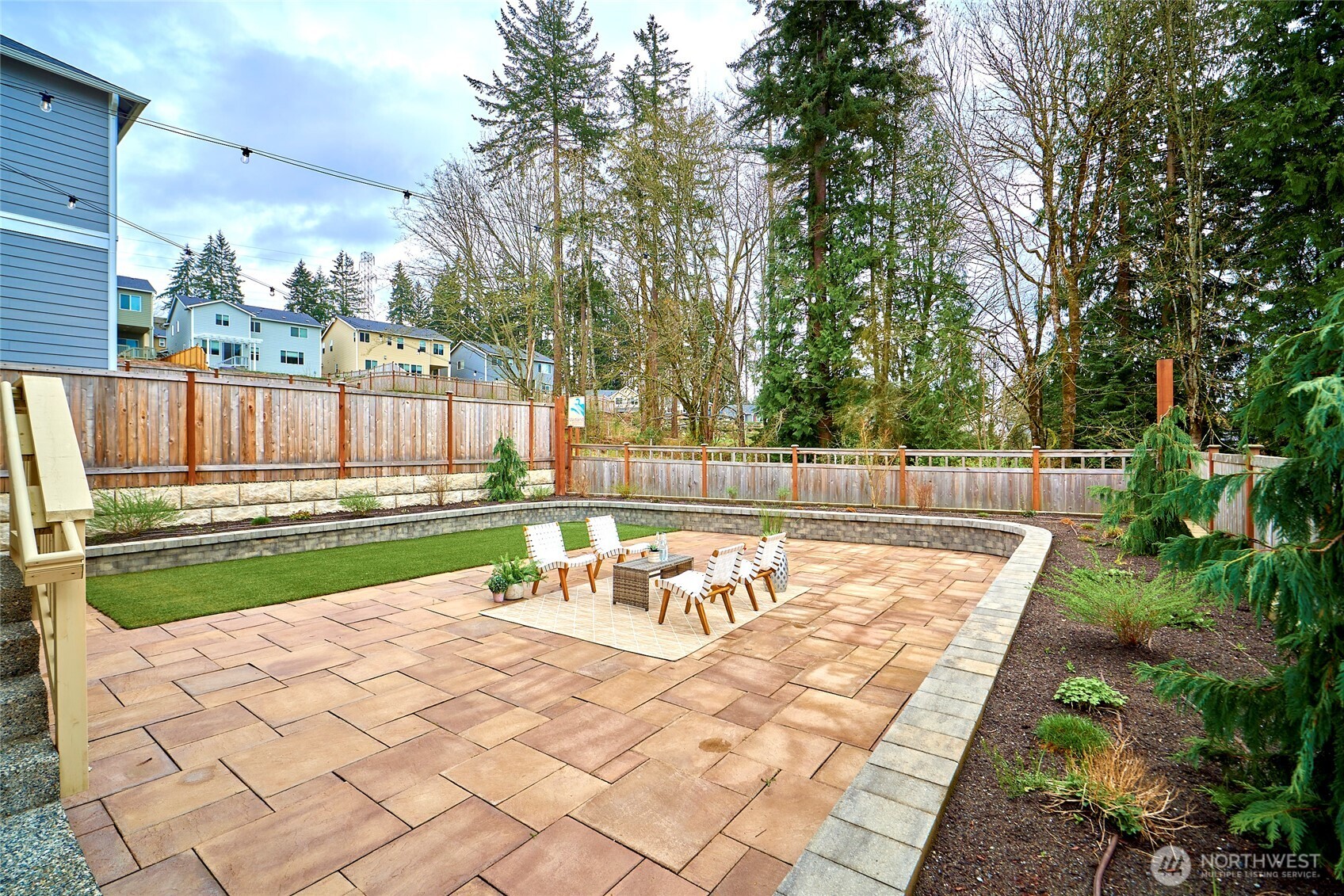 4022 233rd Street Southeast Bothell, WA 98021 - Photo 35 of 40 a view of swimming pool with wooden deck and outdoor seating