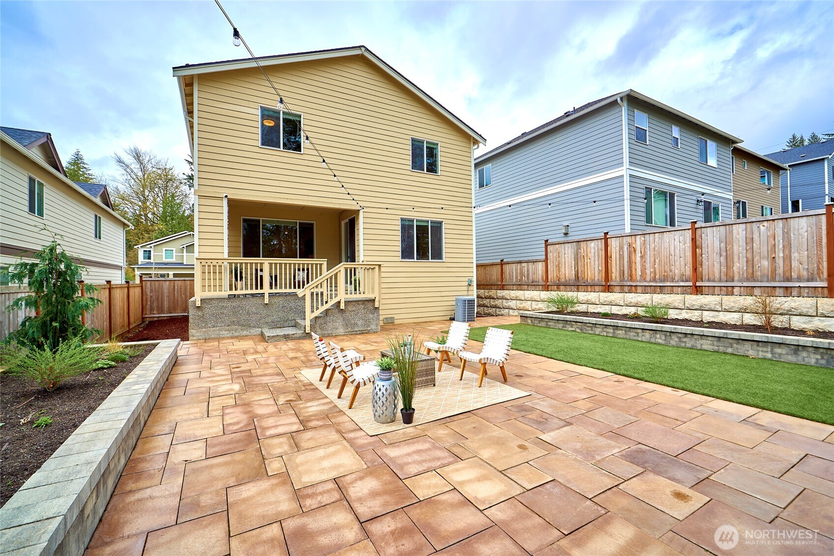 4022 233rd Street Southeast Bothell, WA 98021 - Photo 37 of 40 a view of house with backyard porch and garden