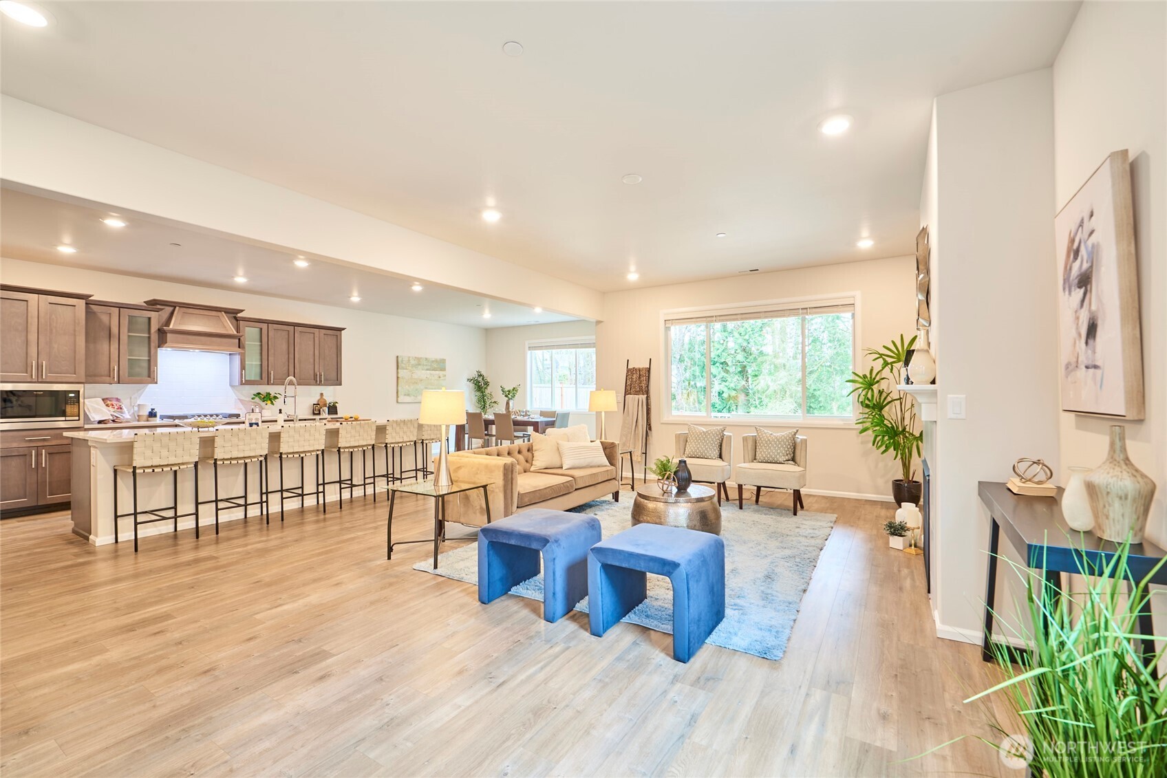 4022 233rd Street Southeast Bothell, WA 98021 - Photo 4 of 40 a living room with furniture wooden floor and a large window