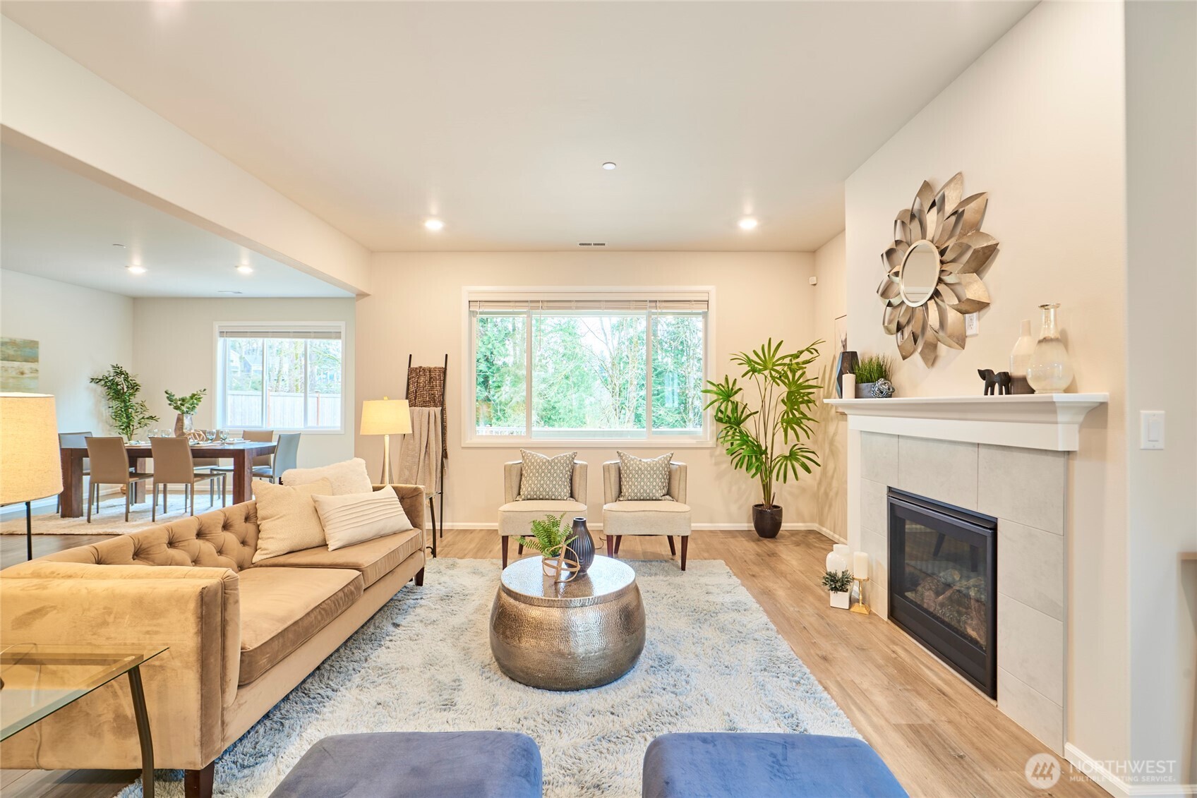 4022 233rd Street Southeast Bothell, WA 98021 - Photo 5 of 40 a living room with furniture and a fireplace