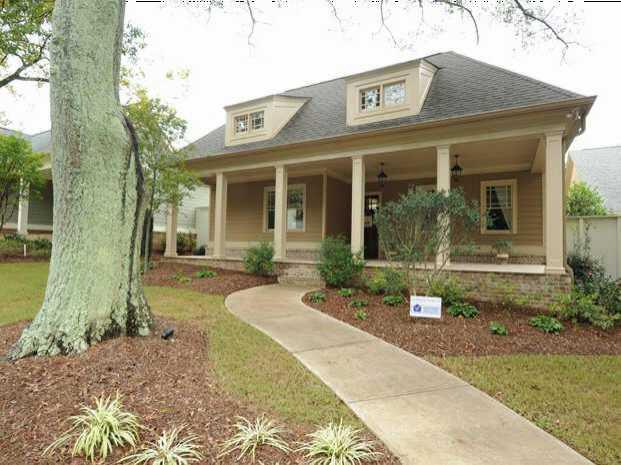 Exterior Front. Beautiful Craftsman home located in picturesque Hapeville Georgia, Professional landscaping maintained by community HOA.