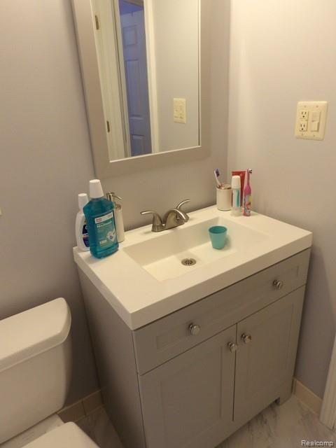 7911 Merrick Street Taylor, MI 48180 - Photo 26 of 42 26. NEW DESIGNER VANITY WITH ONE-PIECE MOLDED SINK!