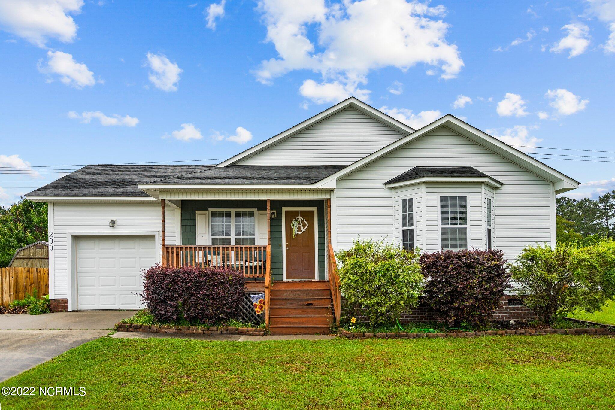 200 Oak Ridge Lane Holly Ridge, NC 28445 - Photo 1 of 41 Front Elevation
