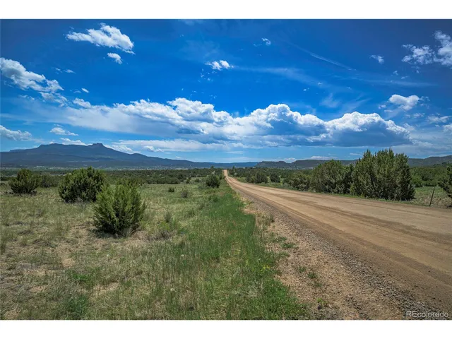 a view of an outdoor space and mountain view