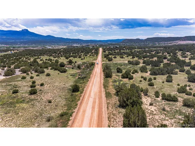 a view of a city with mountain