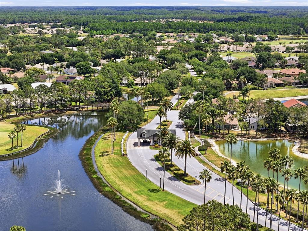 1444 Canberley Court Trinity, FL 34655 - Photo 11 of 52 an aerial view of a house with a lake view