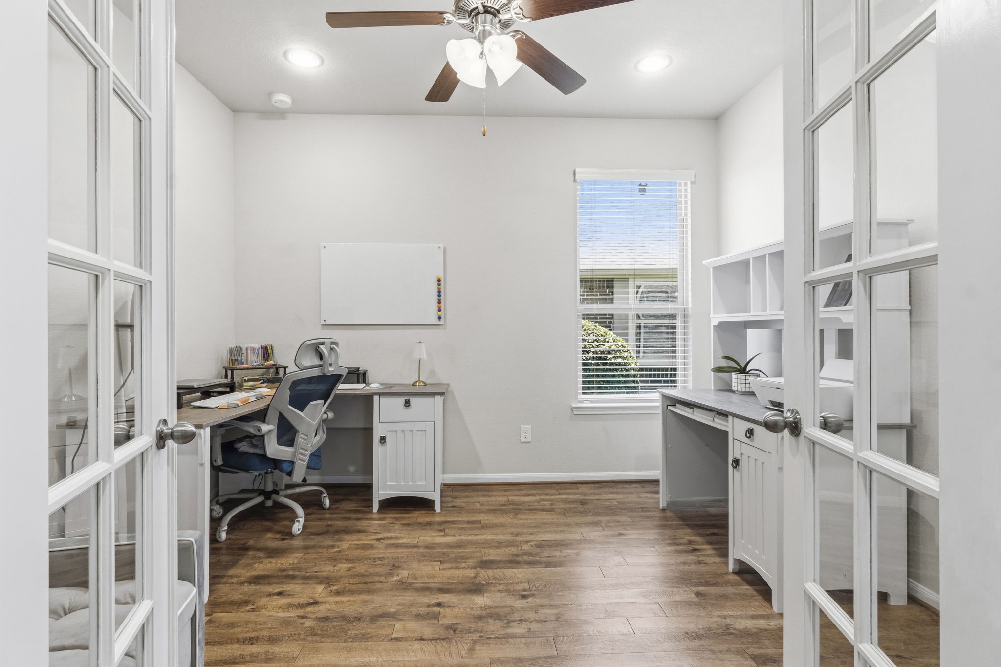 3900 Enchanted Timbers Lane Spring, TX 77386 - Photo 26 of 49 a view of a kitchen with furniture and a wooden floor