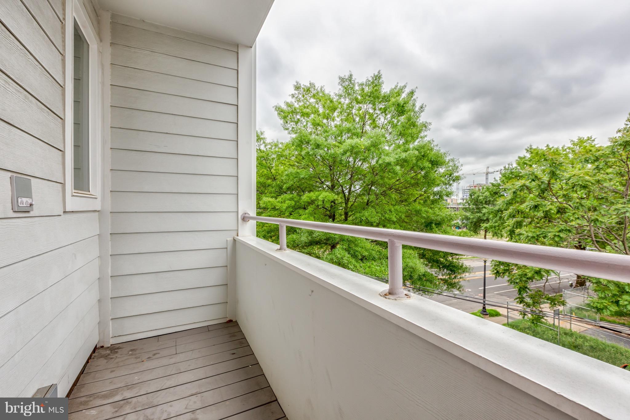 239 R Street Northeast, Unit B Washington, DC 20002 - Photo 7 of 20 Balcony off main level bedroom
