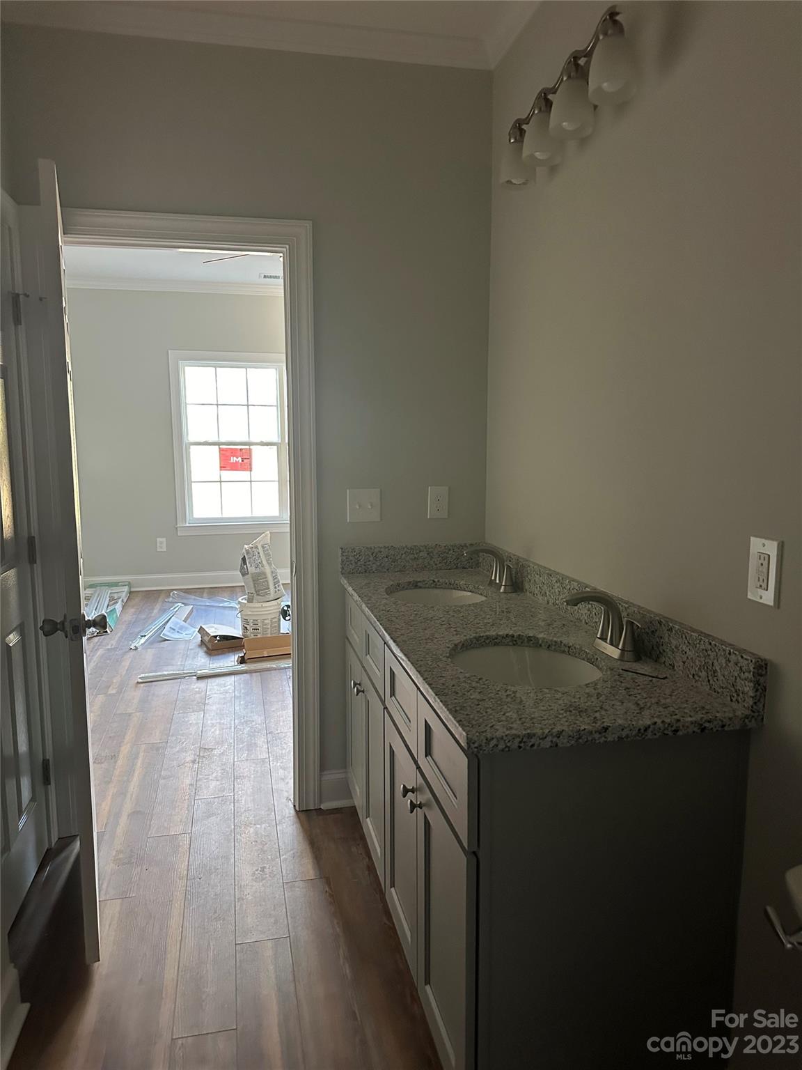 3807 Red Doc Road Lancaster, SC 29720 - Photo 6 of 7 a bathroom with a granite countertop sink a vanity and mirror