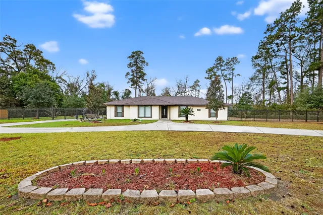 $495,000 | 1011 Chateau Woods Pkwy Drive, Conroe, TX 77385