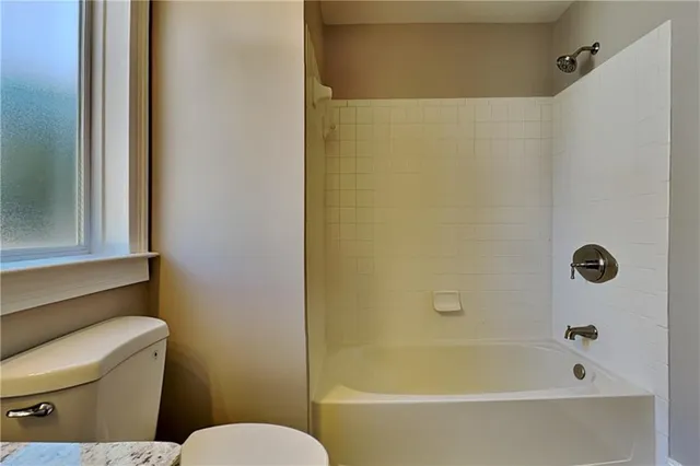 a bathroom with a sink and a bathtub
