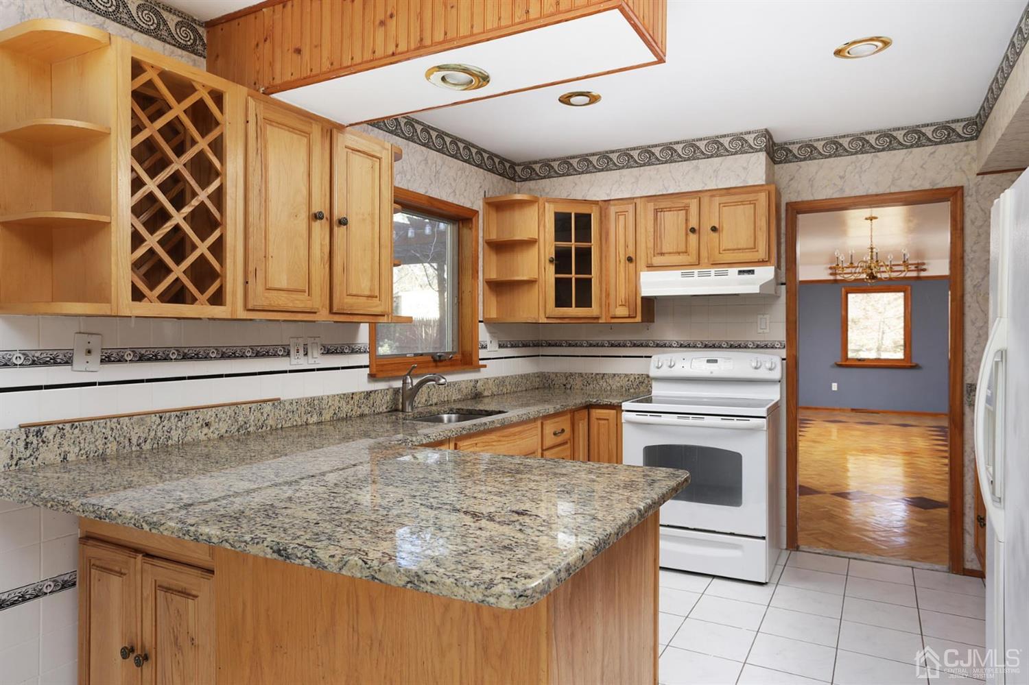 75 Lakeridge Drive Old Bridge, NJ 07747 - Photo 12 of 26 a kitchen with a sink and cabinets