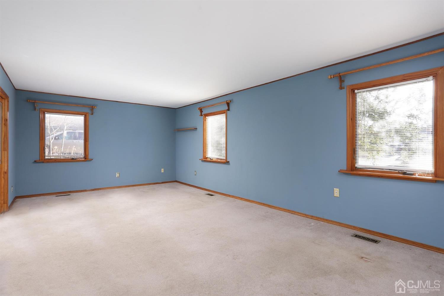 75 Lakeridge Drive Old Bridge, NJ 07747 - Photo 16 of 26 an empty room with windows