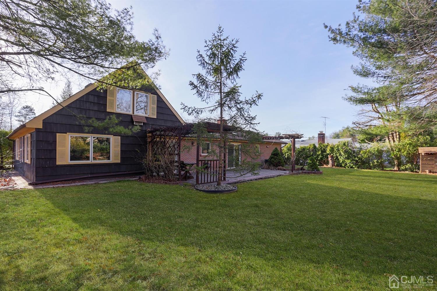 75 Lakeridge Drive Old Bridge, NJ 07747 - Photo 25 of 26 a view of a house with a yard