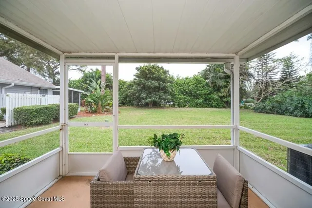 a view of swimming pool from a porch