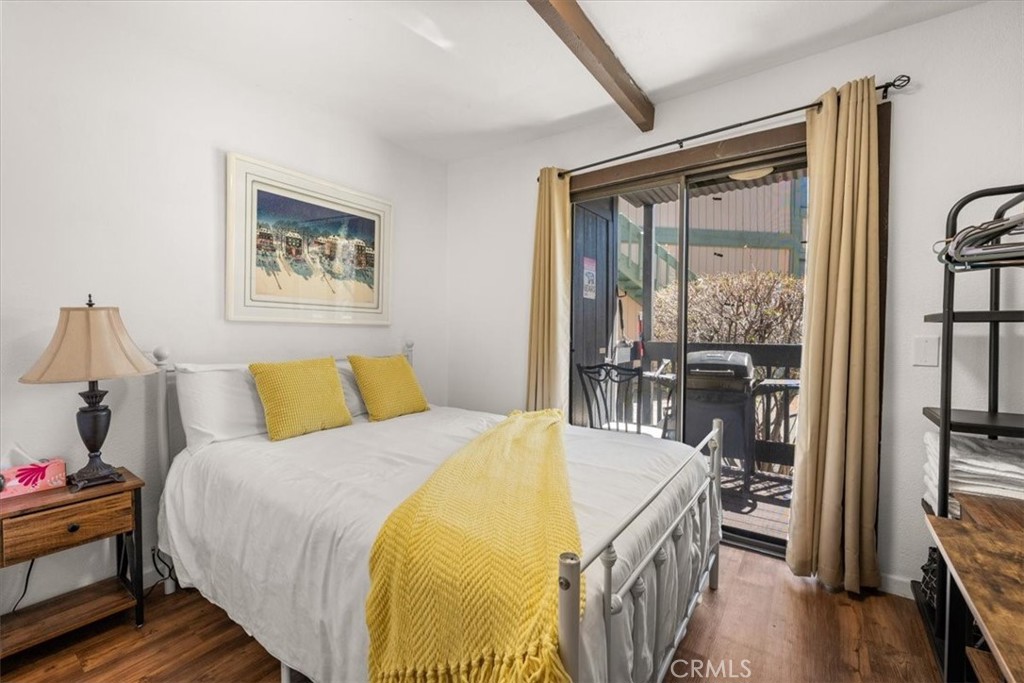 760 Bluejay Road, Unit 1 Big Bear Lake, CA 92315 - Photo 16 of 29 a bedroom with a bed and a window