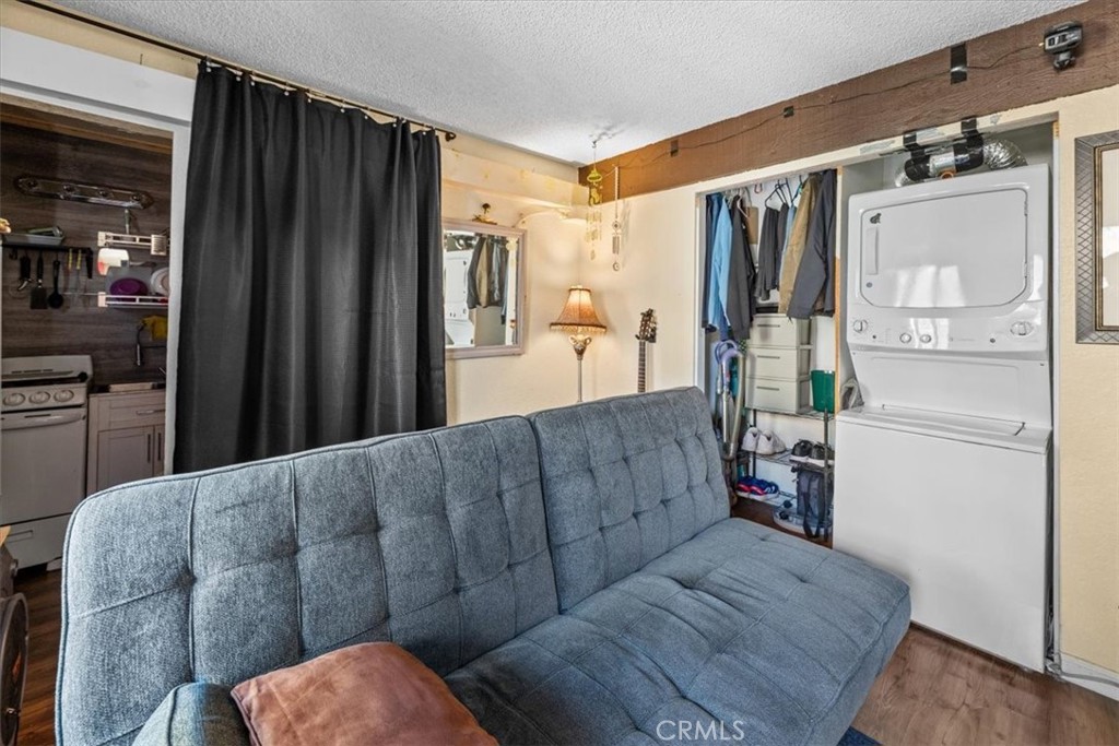 760 Bluejay Road, Unit 1 Big Bear Lake, CA 92315 - Photo 24 of 29 a living room with furniture and a window
