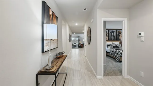a bathroom with a sink mirror and a shower