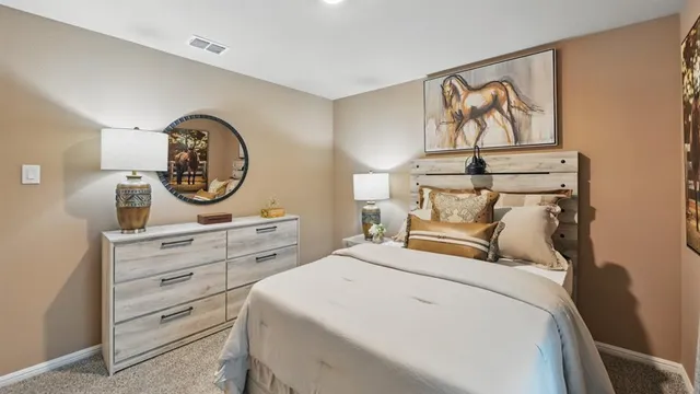 a bathroom with a sink a mirror and a vanity