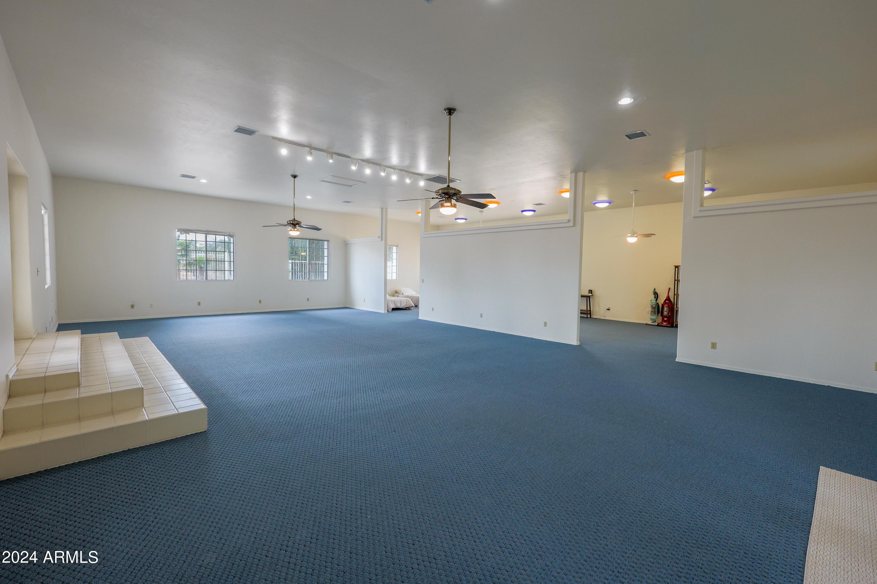 2204 North Maple Avenue Huachuca City, AZ 85616 - Photo 18 of 65 a view of an empty room with kitchen and a window