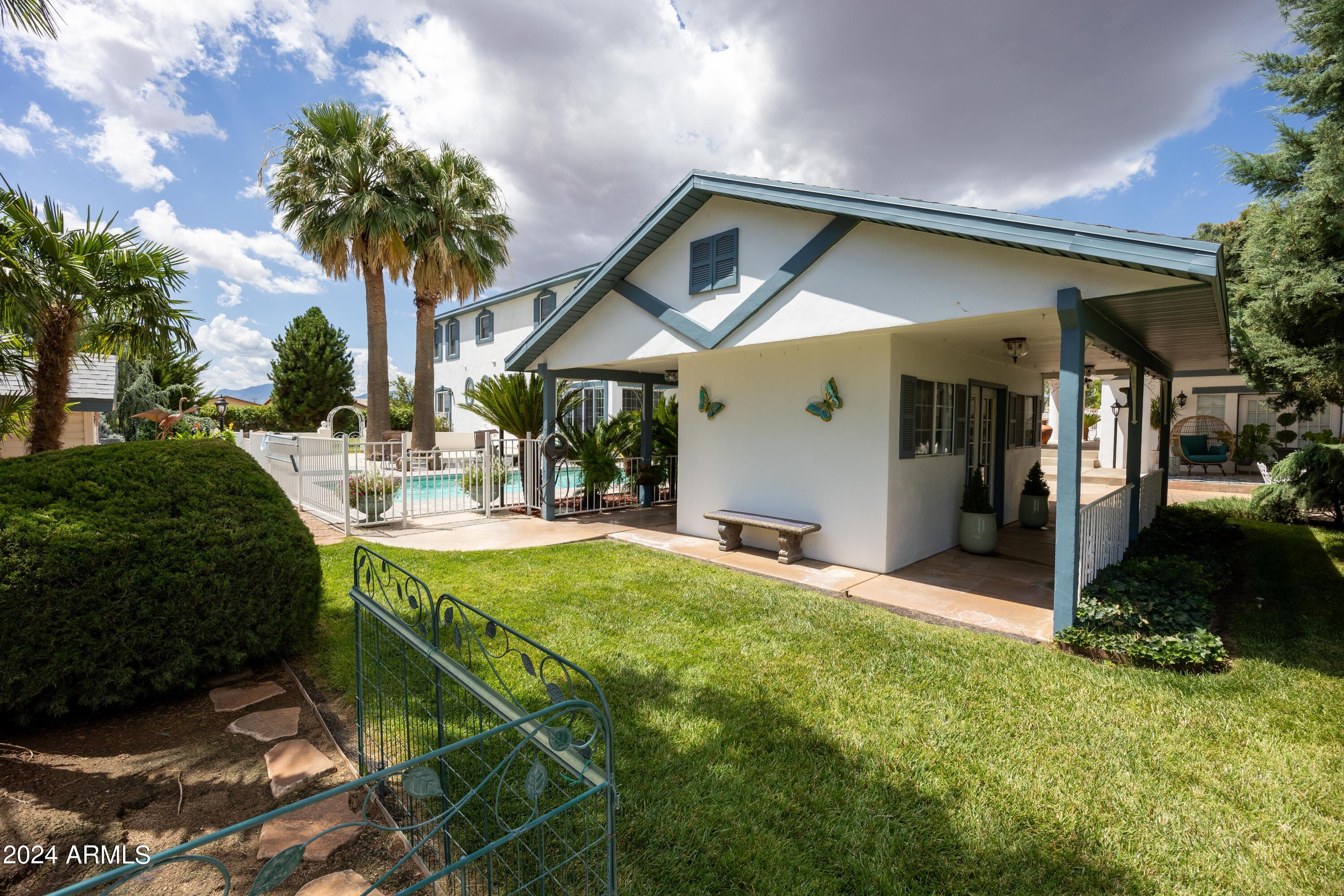 2204 North Maple Avenue Huachuca City, AZ 85616 - Photo 20 of 65 a view of an house with backyard and a patio