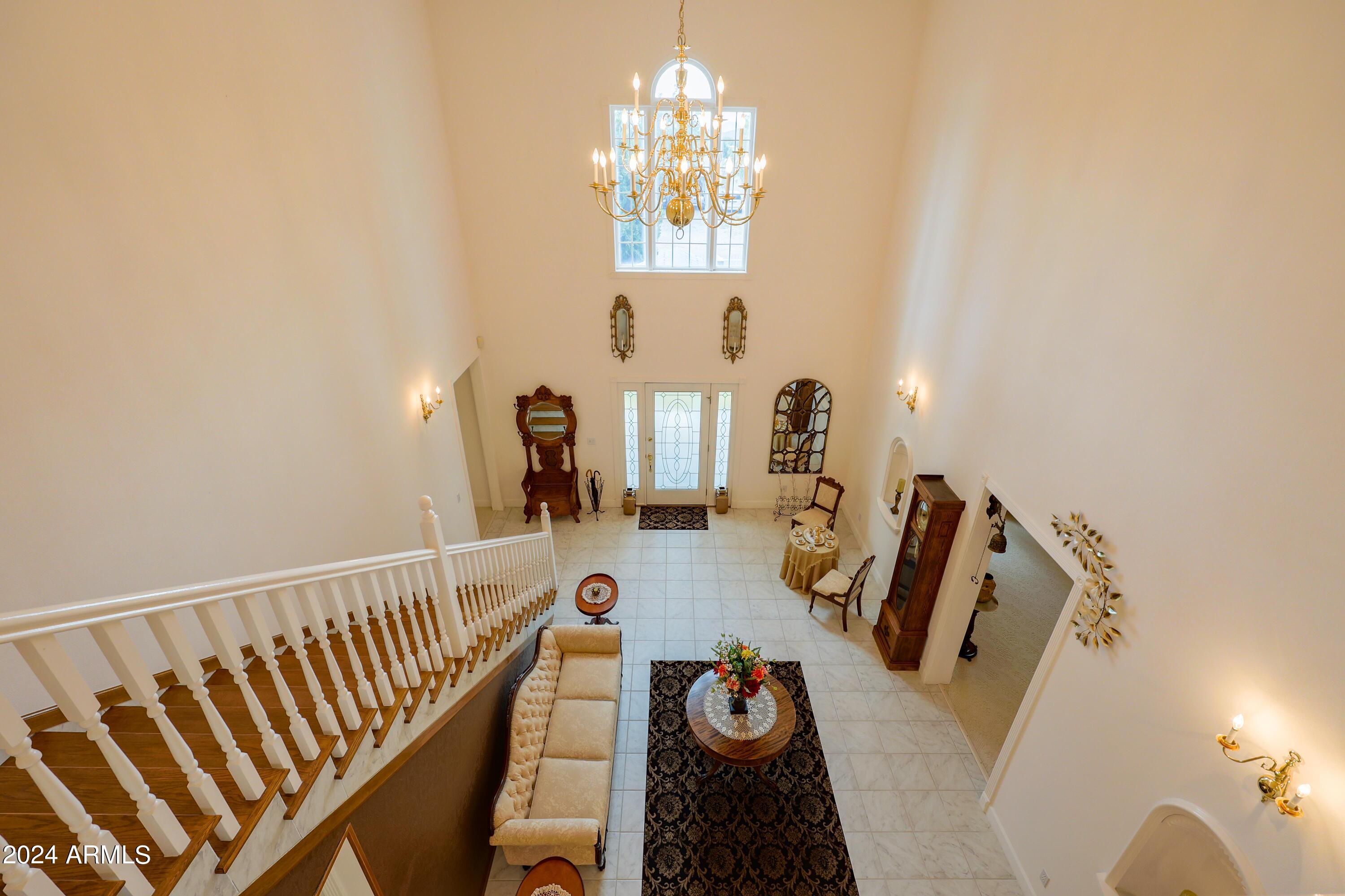 2204 North Maple Avenue Huachuca City, AZ 85616 - Photo 48 of 65 a view of a dining room with furniture and a chandelier