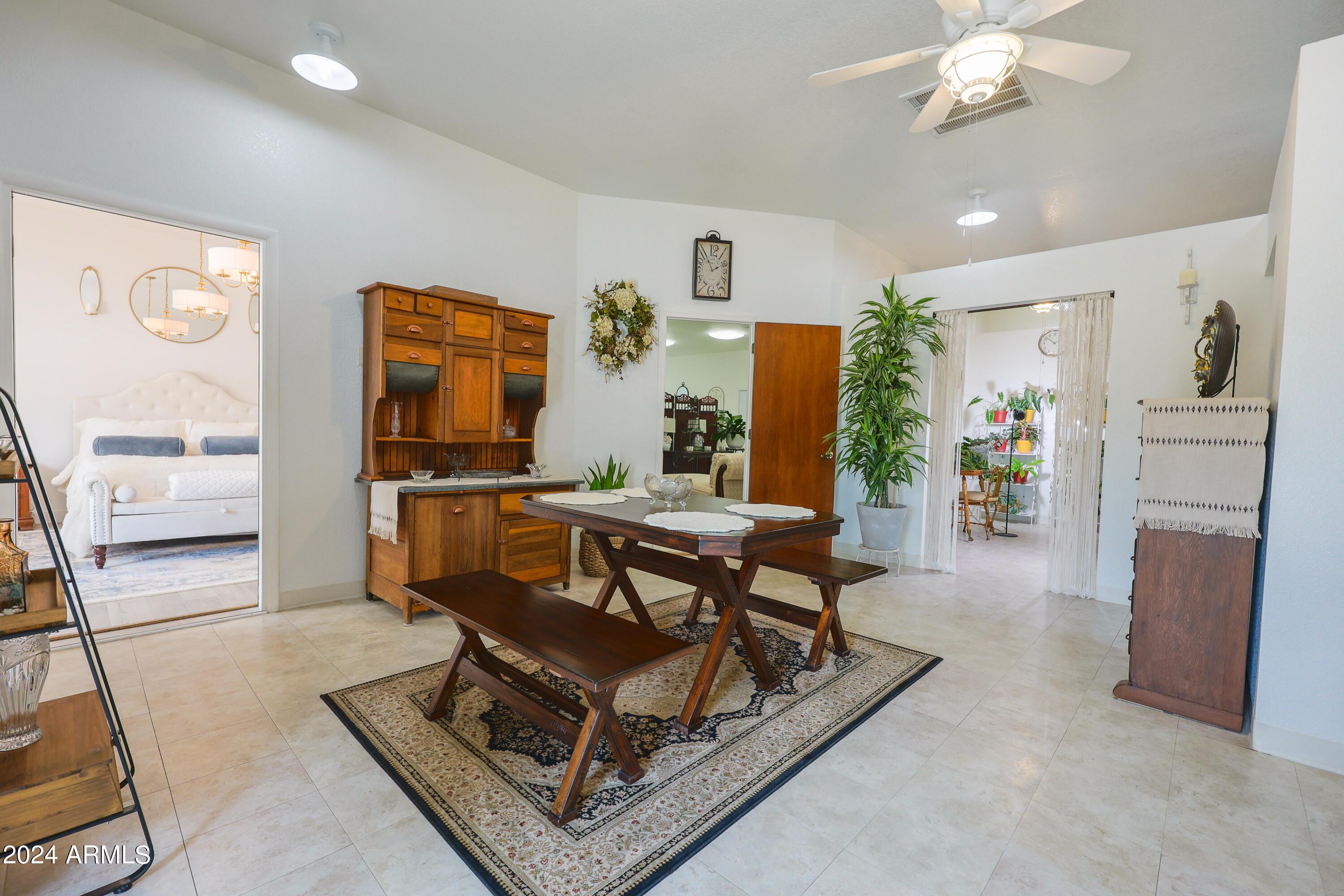 2204 North Maple Avenue Huachuca City, AZ 85616 - Photo 53 of 65 a living room with furniture and a flat screen tv