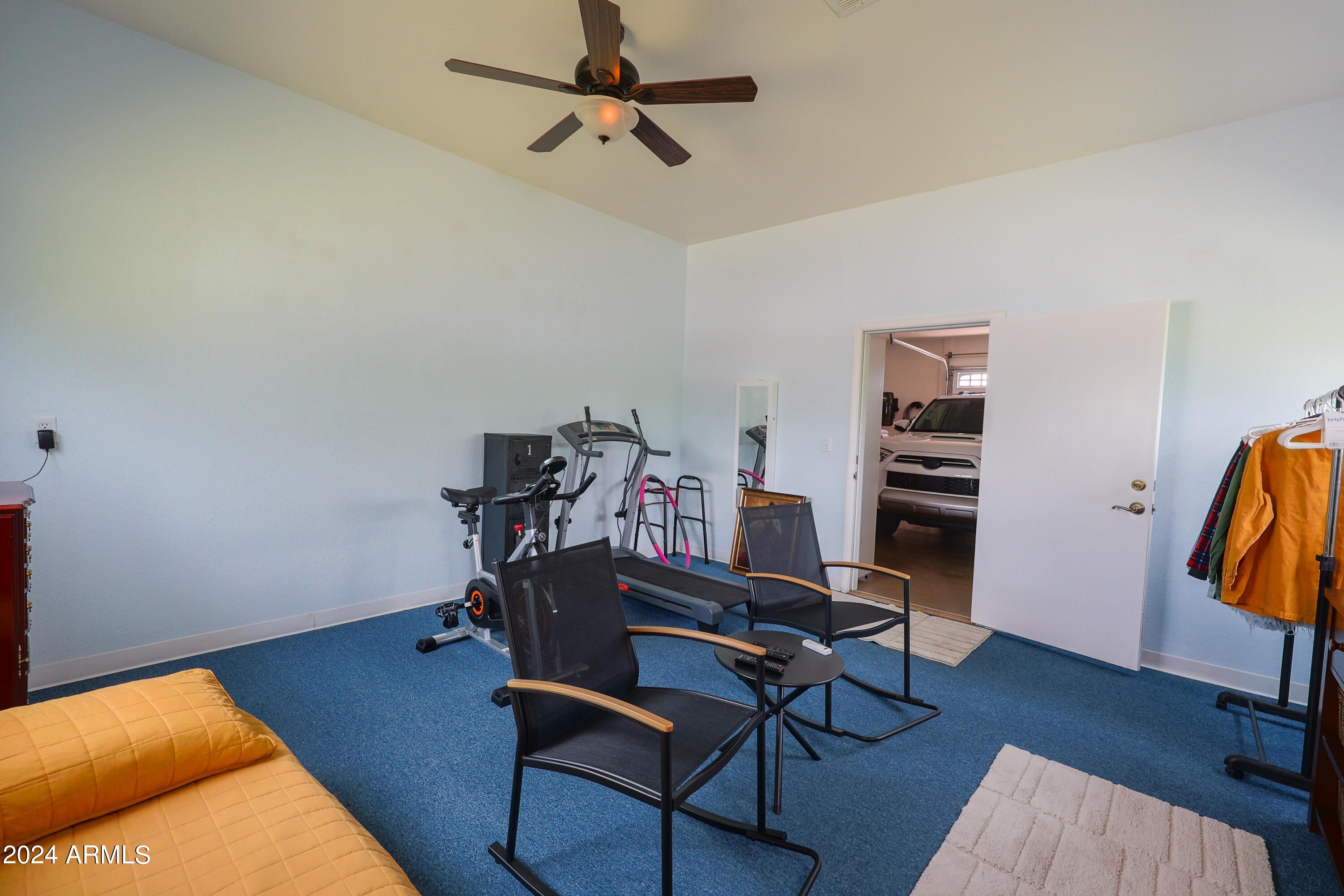 2204 North Maple Avenue Huachuca City, AZ 85616 - Photo 60 of 65 a view of a workspace with furniture and wooden floor