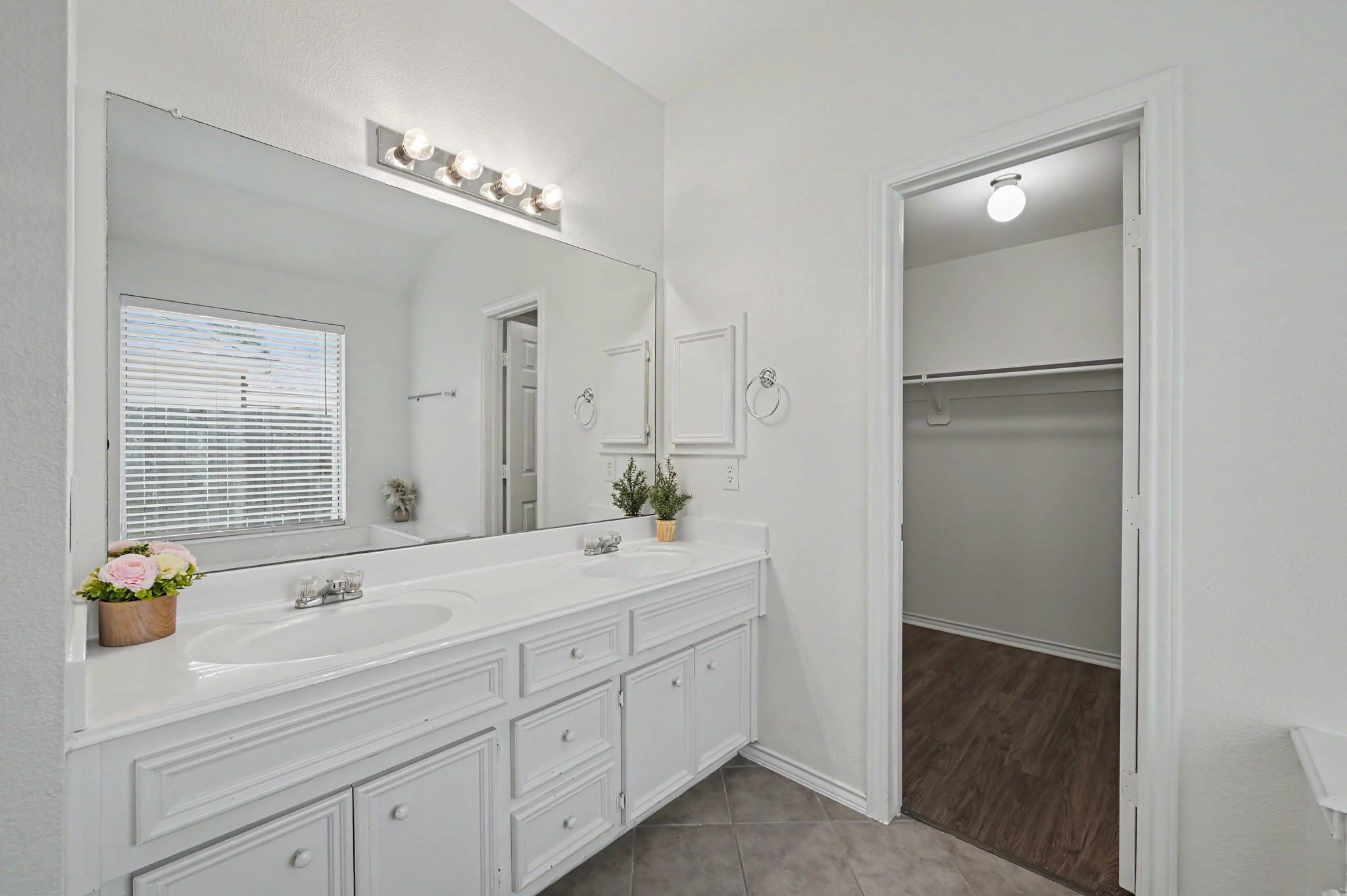 28518 Ashlyn Ridge Lane Spring, TX 77386 - Photo 37 of 50 This bathroom has two sinks to give you more counter space and elbow room as you get ready.