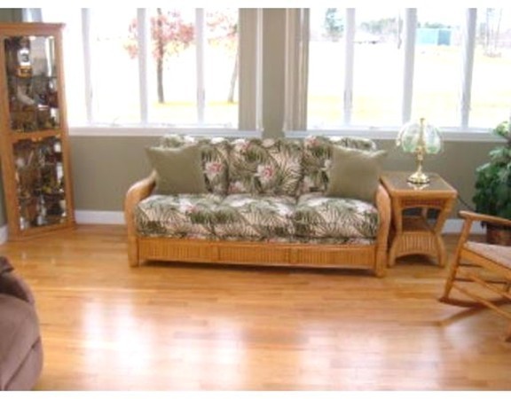 216 Rangeway Road, Unit 144 Billerica, MA 01862 - Photo 11 of 25 a living room with furniture and a large window