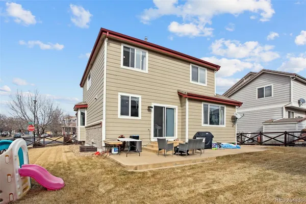 a view of a house with a patio