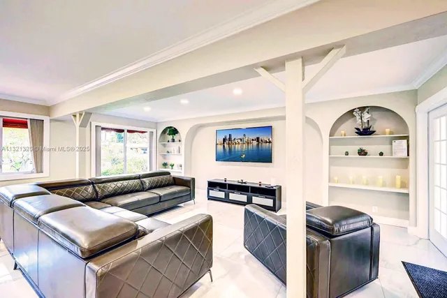 a kitchen with a refrigerator and a stove top oven