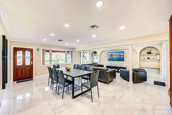 a view of a dining room with furniture