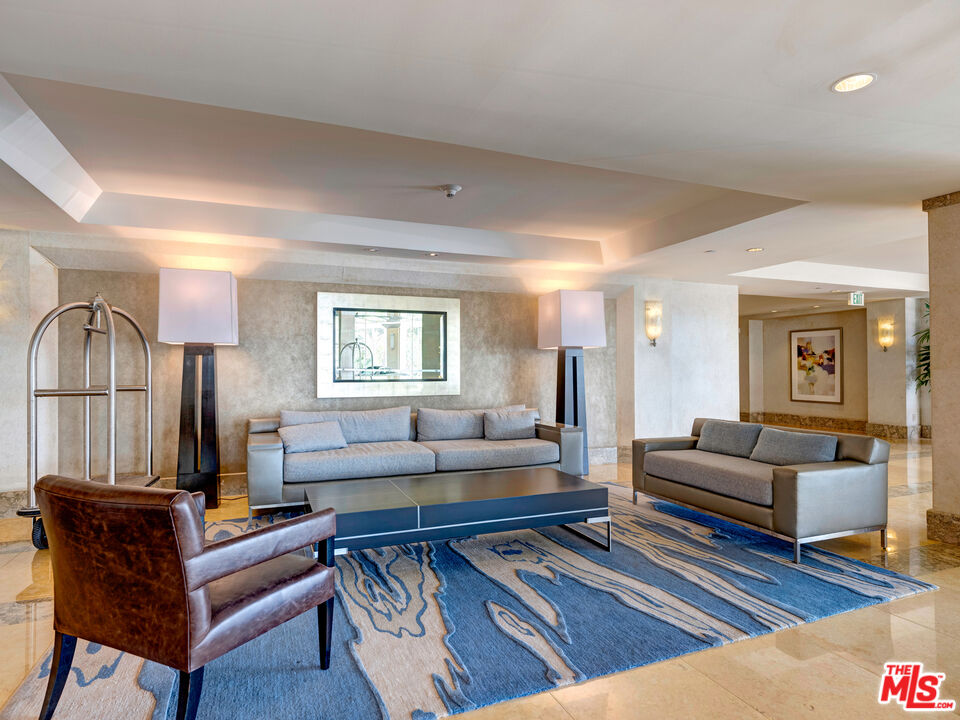 201 Ocean Avenue, Unit 301P Santa Monica, CA 90402 - Photo 45 of 59 a living room with furniture and a wooden floor