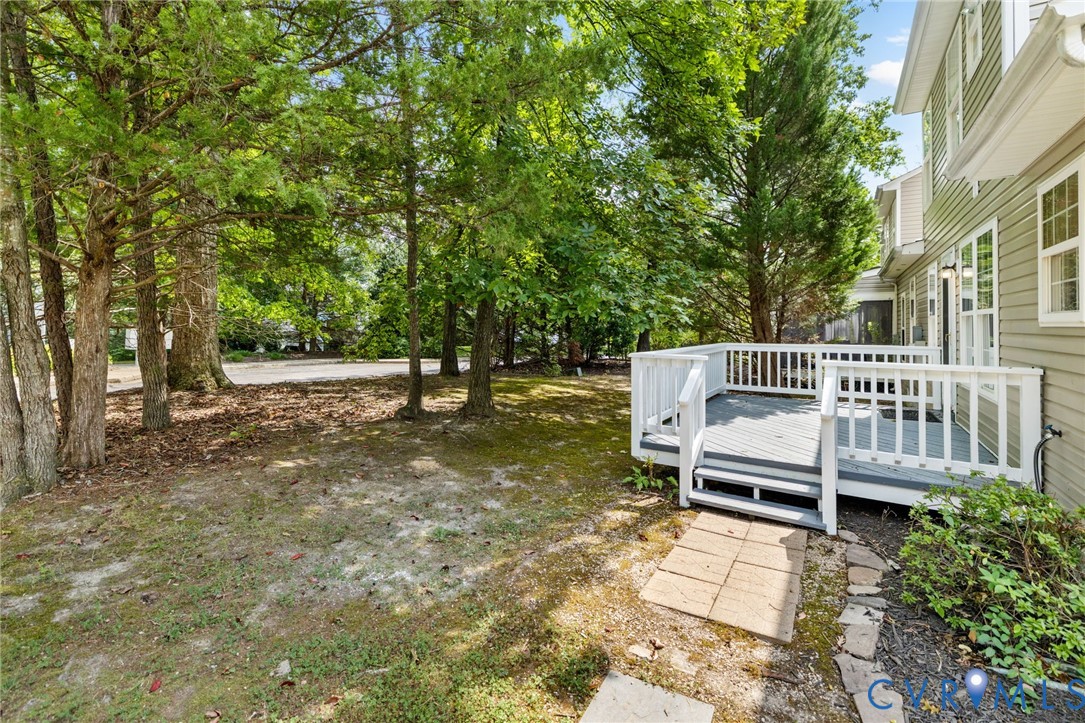 10315 Raintree Commons Court Henrico, VA 23238 - Photo 22 of 24 Outdoor deck with white railings and steps