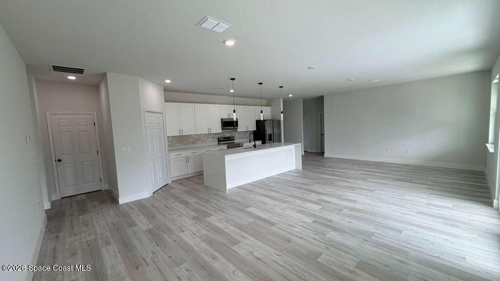 1091 Wing Road Southwest Palm Bay, FL 32908 - Photo 3 of 21 WhatsApp Image 2026-05-29 at 10.48.21 AM