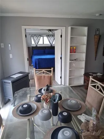 a room with furniture and a chair