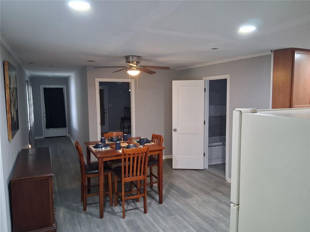 312 Magnolia Avenue Thomaston, GA 30286 - Photo 24 of 40 a dining room with furniture and window