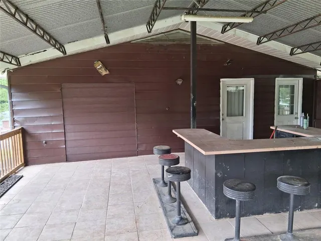 a bathroom with a sink and mirror