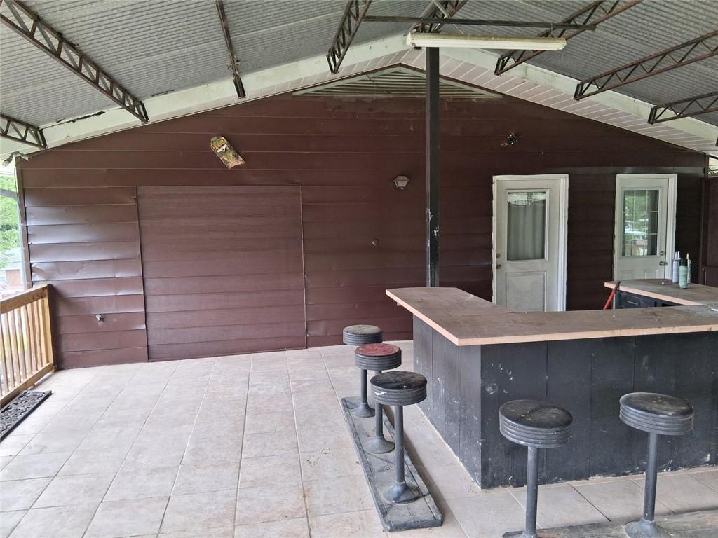 312 Magnolia Avenue Thomaston, GA 30286 - Photo 37 of 40 a bathroom with a sink and mirror