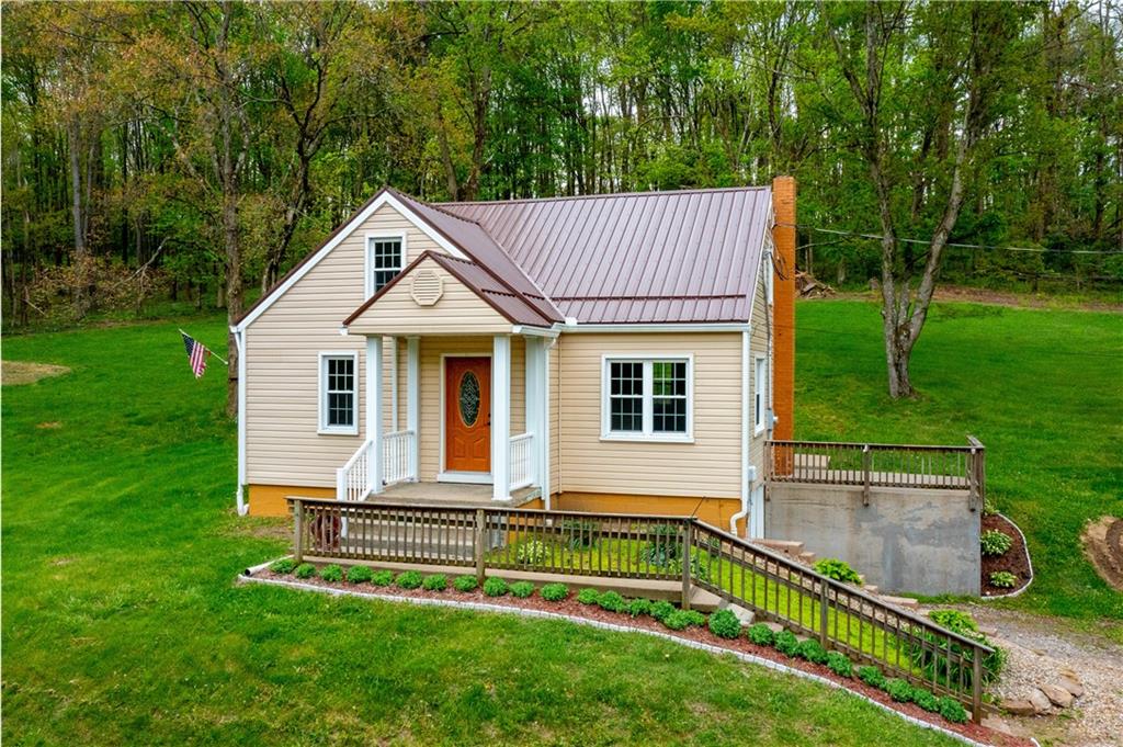 973 Blackhawk Road Beaver Falls, PA 15010 - Photo 1 of 36 a view of a house with a yard