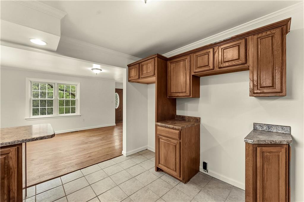 973 Blackhawk Road Beaver Falls, PA 15010 - Photo 11 of 36 a kitchen with stainless steel appliances granite countertop a refrigerator and a sink