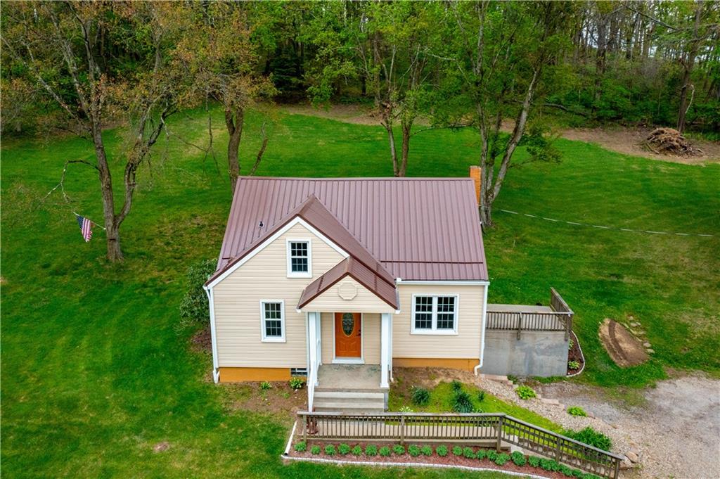 973 Blackhawk Road Beaver Falls, PA 15010 - Photo 2 of 36 a house view with a garden space