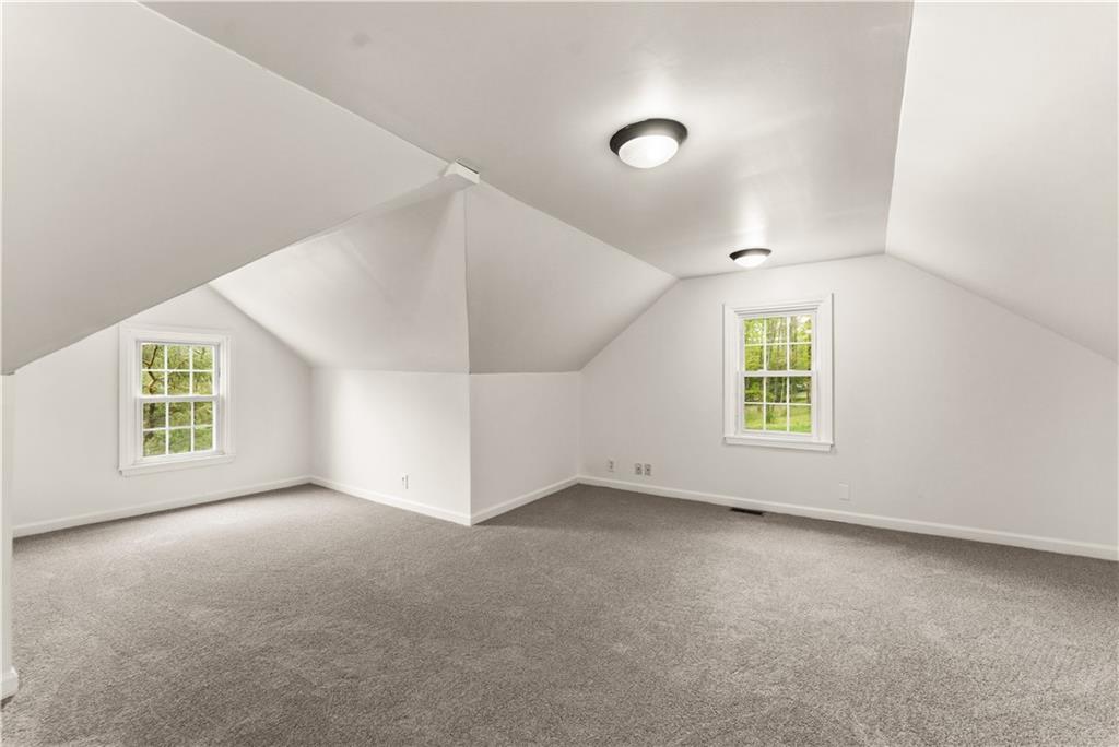 973 Blackhawk Road Beaver Falls, PA 15010 - Photo 21 of 36 an empty room with windows and entrance