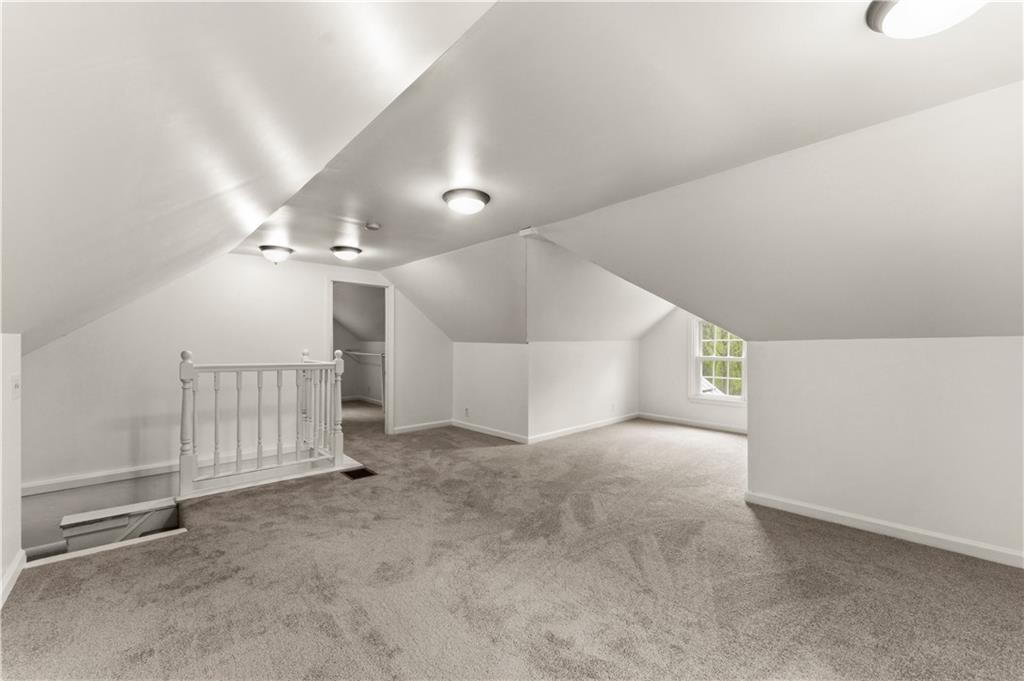 973 Blackhawk Road Beaver Falls, PA 15010 - Photo 22 of 36 en empty room with stairs and white walls