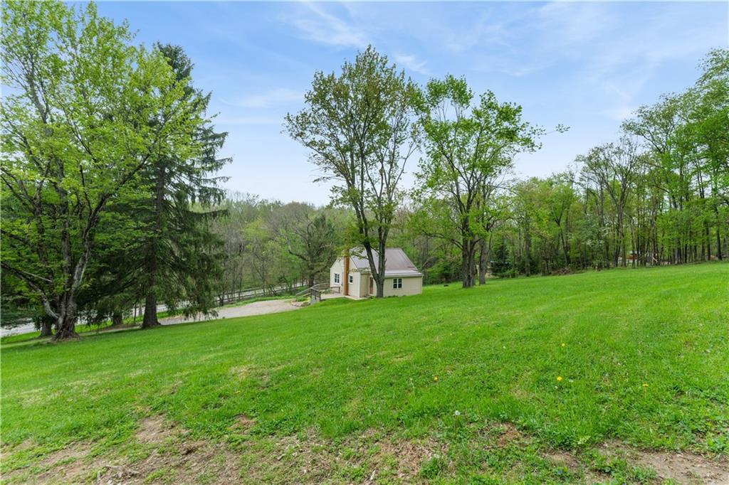 973 Blackhawk Road Beaver Falls, PA 15010 - Photo 33 of 36 a view of a park with a tree in the background