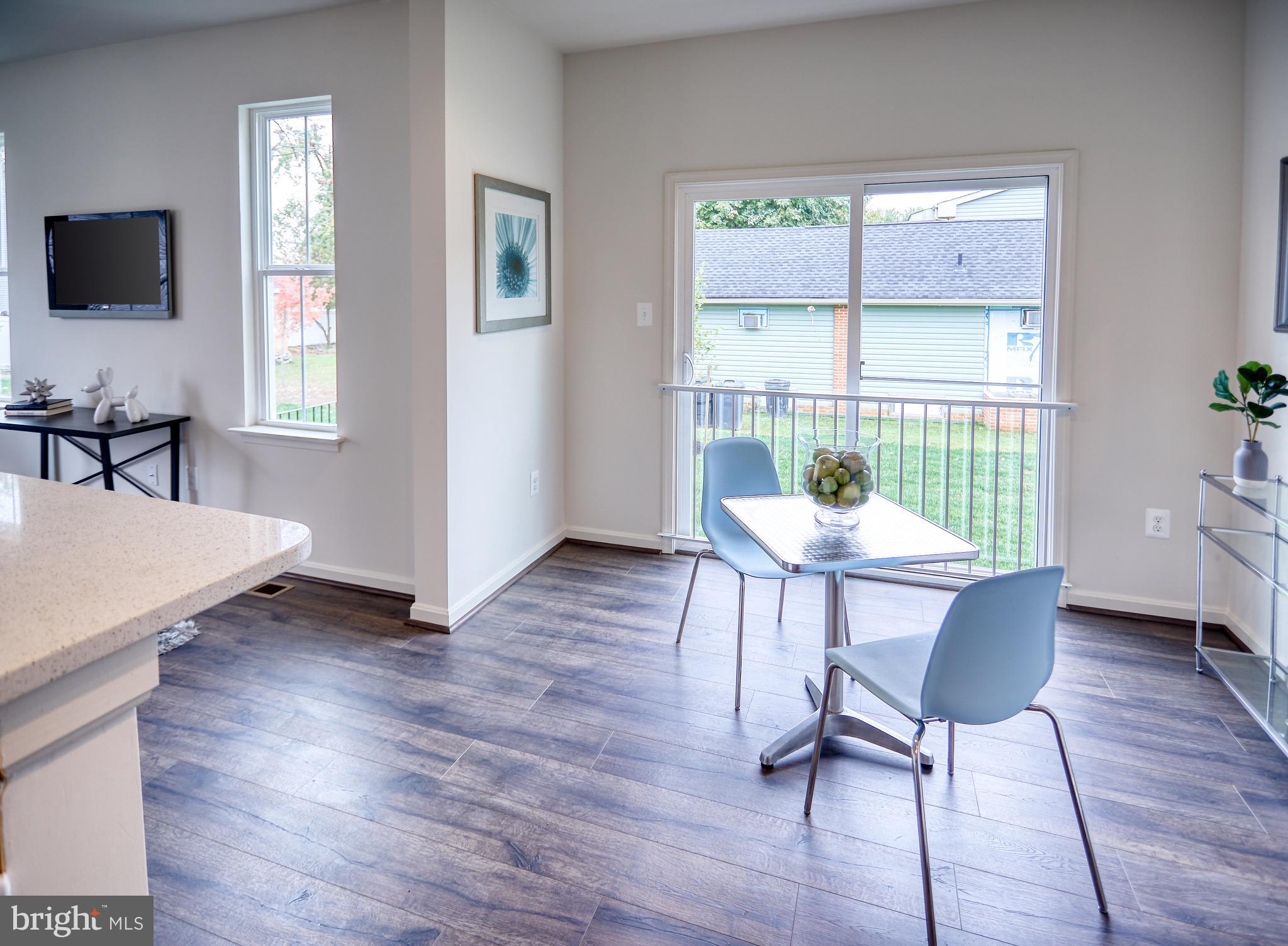 203 Patuxent Avenue Rosedale, MD 21237 - Photo 10 of 32 Sunroom dining area off of Kitchen