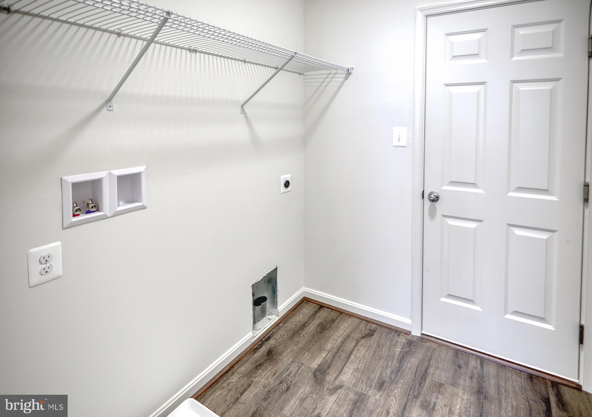 203 Patuxent Avenue Rosedale, MD 21237 - Photo 14 of 32 Laundry Room leading to Garage